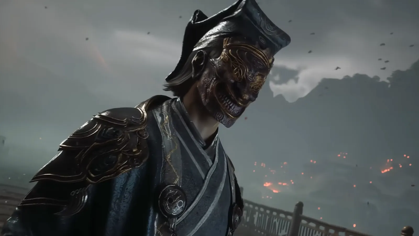 A masked swordsman in dark armoured robes and a tricorn-style hat stands on a bridge, embers drifting in the grey sky behind him.