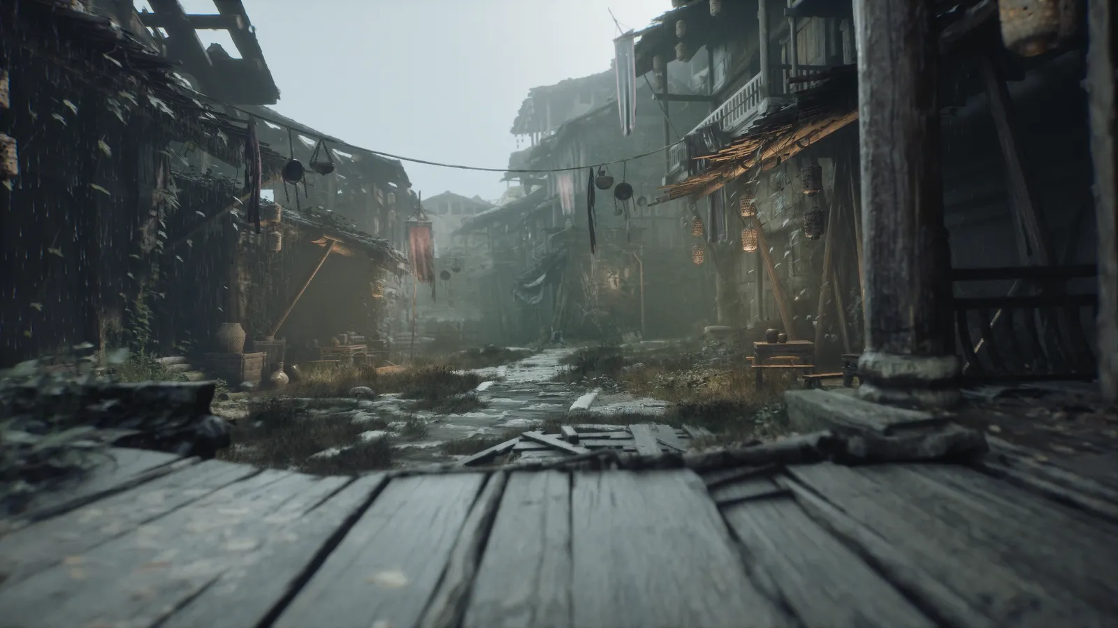 Rain-soaked village street seen from a wooden porch, with lantern strings, hanging cloth and leaning timber houses.