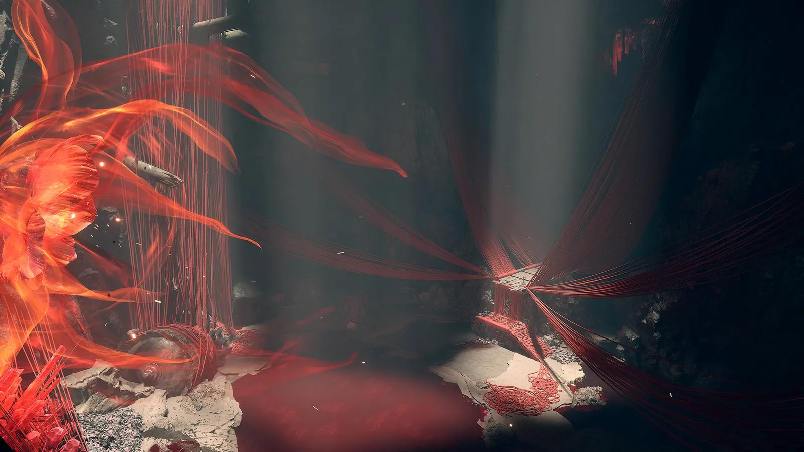 Red threads and a burst of orange flame spread across a ruined floor in a dark chamber during a fight effect.